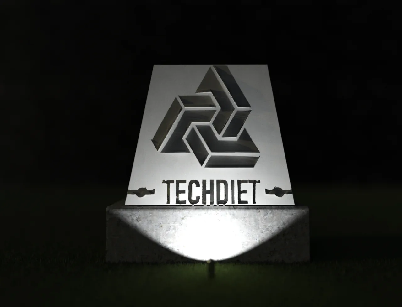 Logo stone with directional light casting a brand shadow